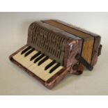 A Hohner Mignon miniature accordion