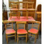 A retro melamine topped extending fining table and six bentwood chairs.