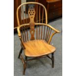 A 19th century ash and elm hall chair.