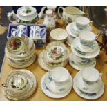 A Staffordshire tea set for six printed with irises and fern leaves; another printed with fruit;