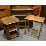 An early 20th century open bookcase; an octagonal oak table unit;