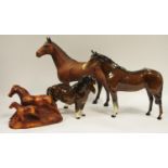A Beswick chestnut horse; another large (af); a John Beswick calf model etc.