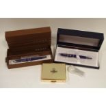 Advertising - a Rolls-Royce Cross ATX roller ball pen, translucent blue lacquer,