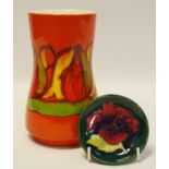 A flared Poole vase, stamped to base marked 83 A signed 'tf'; a Moorcroft Hibiscus pattern pin tray,