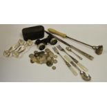 Coins, candle snuffer, opera glasses, pickle forks,