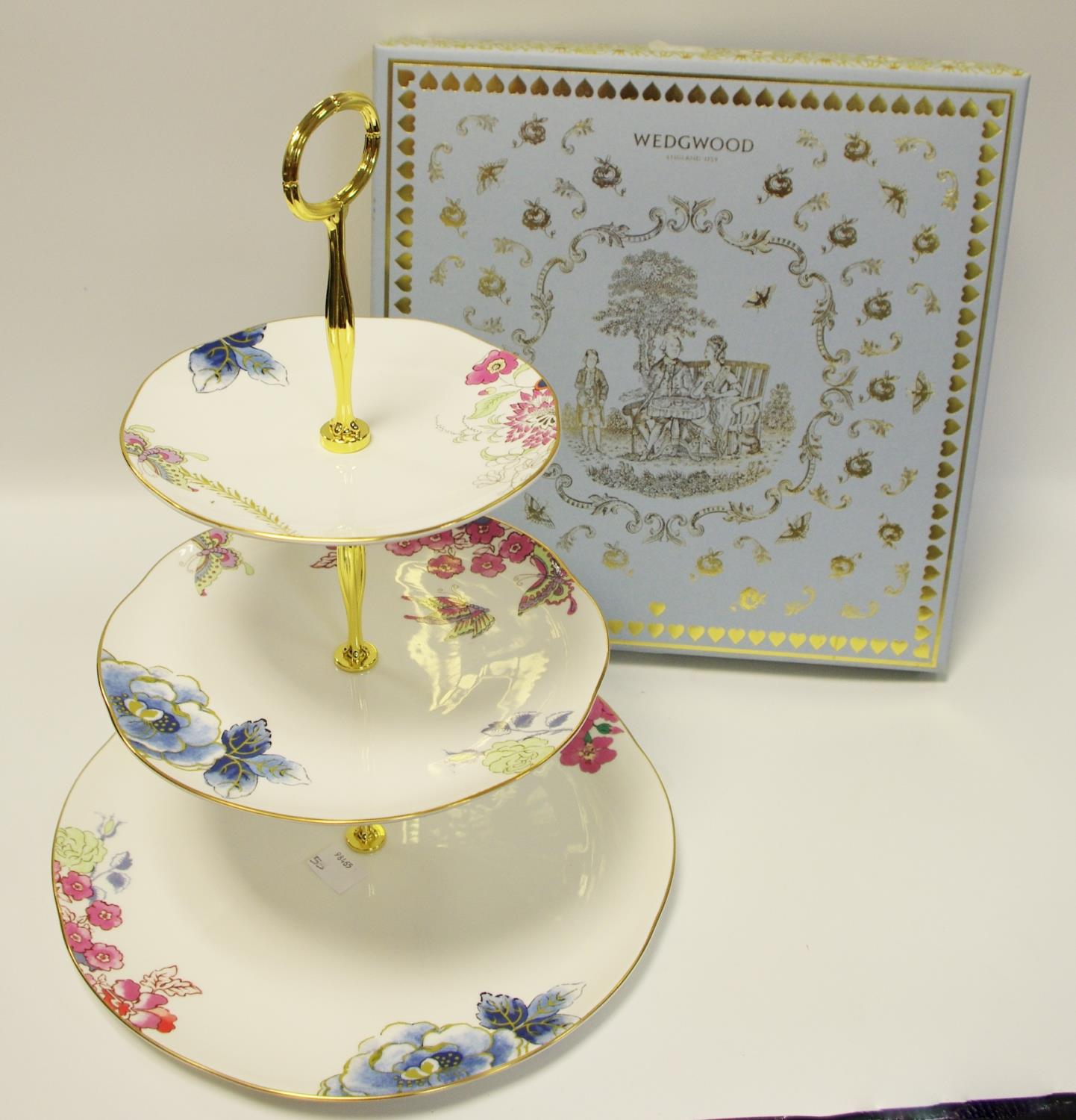 A Wedgwood Butterfly Bloom three tier cake stand with gilt metal mounts,