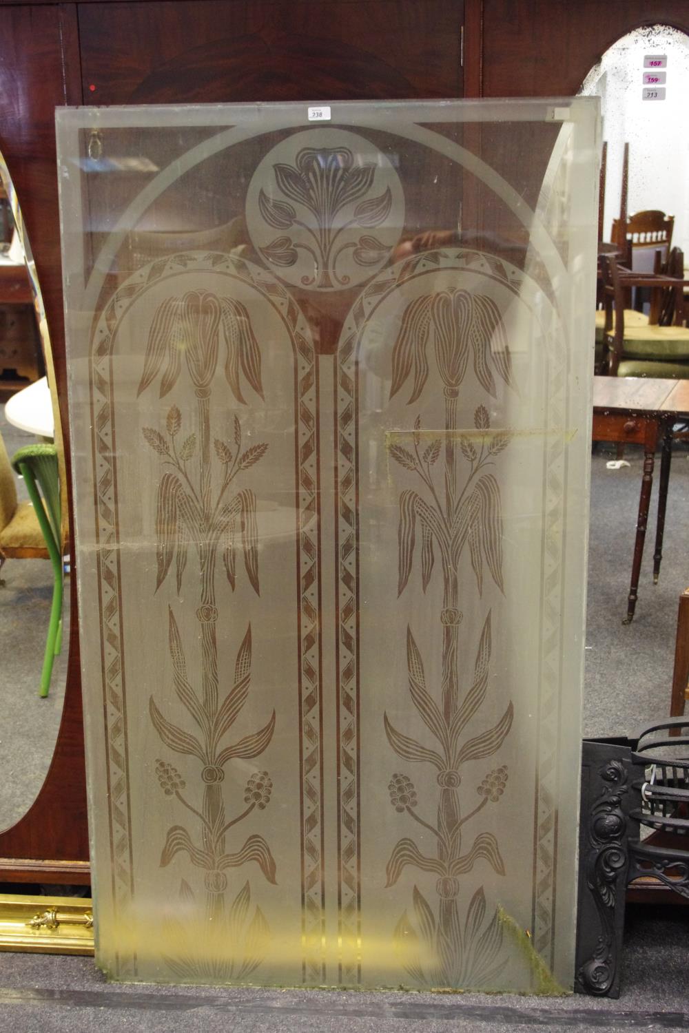 A large early 20th century etched window pane.
