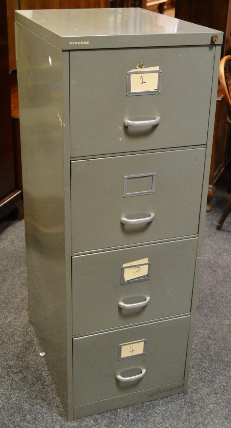 A large Vickers metal four drawer filing cabinet