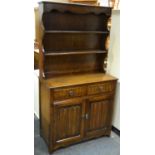 A Priory style oak dresser, two shelves to top,