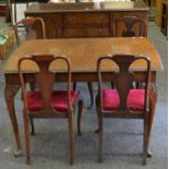 A reproduction mahogany Queen Anne dining suite comprising sideboard, carved border,