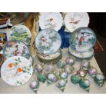 Sixteen Bradford Exchange ceramic garden baubles;