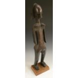 Tribal Art - a Sefufo hermaphrodite figure, highly stylised features, they stand,