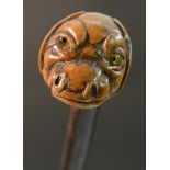 A 19th century gentleman's novelty walking cane, the pommel carved as the head of an animal,