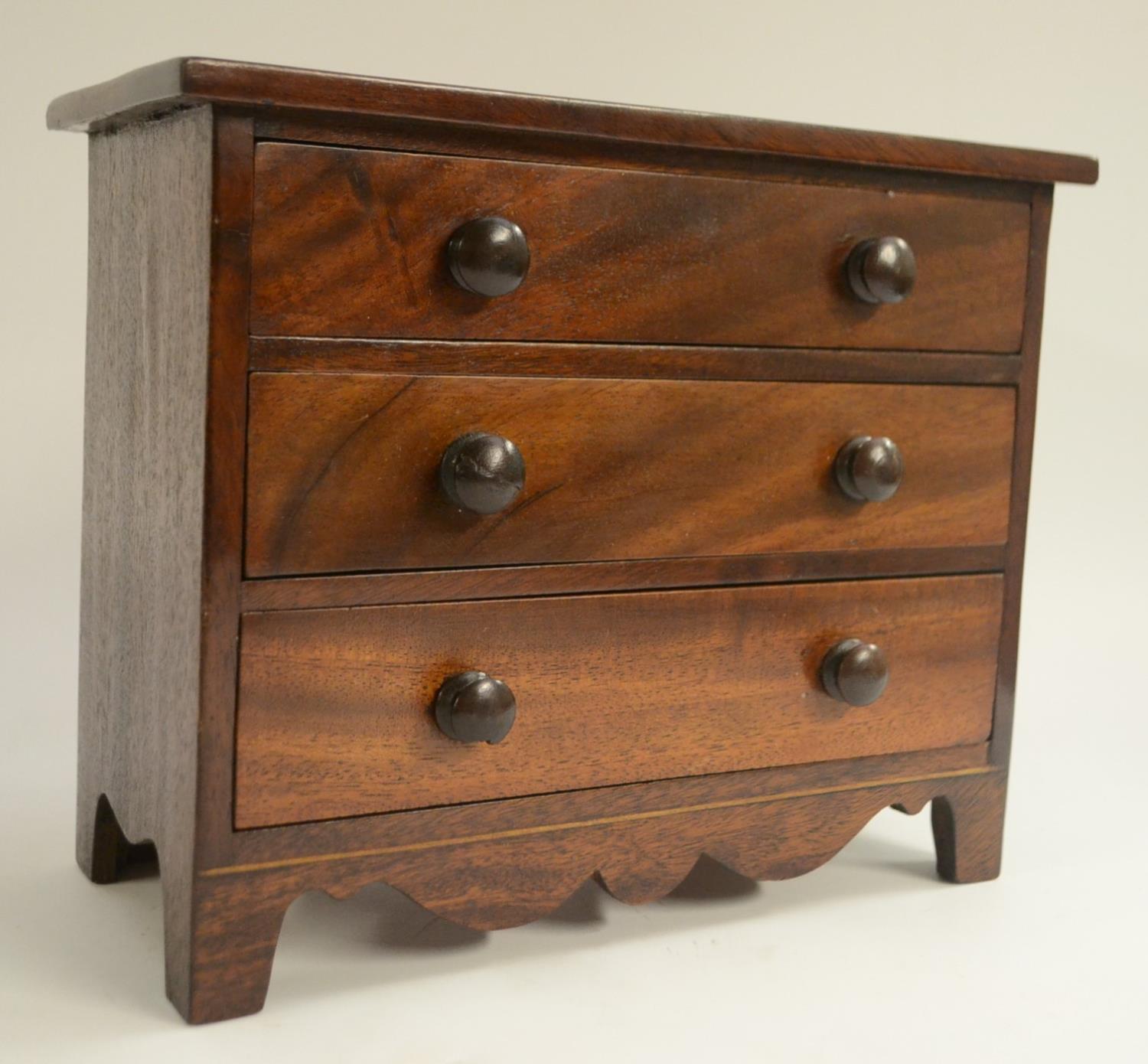 A 19th century mahogany miniature chest of drawers,