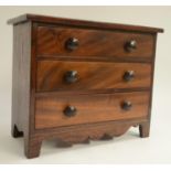 A 19th century mahogany miniature chest of drawers,