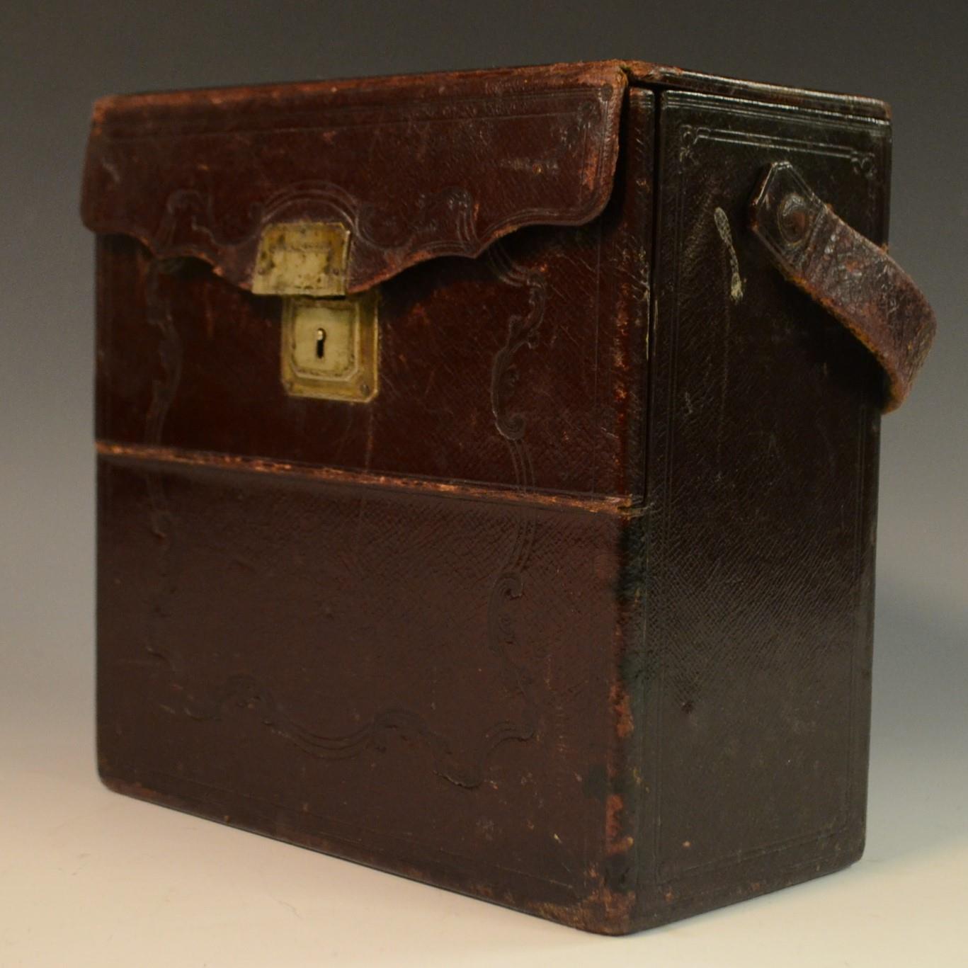 A 19th century tooled morroco leather box, probably for stereoscopic viewer cards,