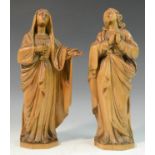 A pair of South European softwood carvings, in the Baroque manner as the Virgin and a Saint, 27.
