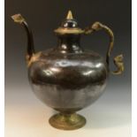 A substantial Indo-Persian steel and brass wine pot,