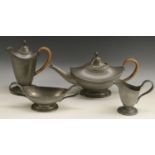 A Liberty Tudric Pewter Arts and Crafts period four-piece tea service, comprising teapot, water jug,