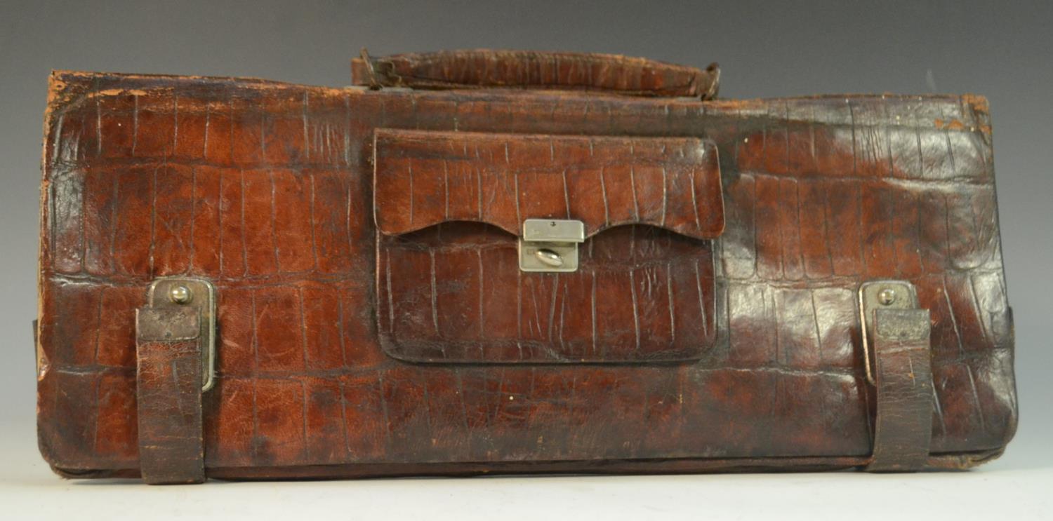 An early 20th century crocodile skin rounded rectangular portfolio or document case,