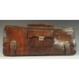 An early 20th century crocodile skin rounded rectangular portfolio or document case,