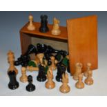 A boxwood and ebonised Staunton pattern chess set,