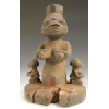 Tribal Art - a Yoruba awo ota erinle or apoti ifa cover, carved with a maternity figure,