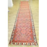 A Middle Eastern rectangular woollen carpet,