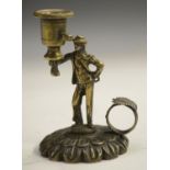 An early 19th century bronze chamber taperstick, lotus base,
