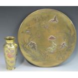 A Japanese bronze and mixed metal circular charger, chased and applied with boys busy on the river,