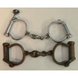 Crime and Punishment - a pair of Haitt Best cast steel handcuffs, numbered 339,