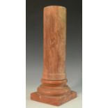 A Grand Tour style rose marble library column, turned socle, square base,