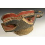 Tribal Art - a Mabila zoomorphic mask, stylised features and open mouth,