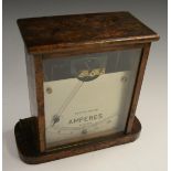 An early 20th century oak gravity-balanced tabletop Amperes meter, by Griffin, London, the 11.
