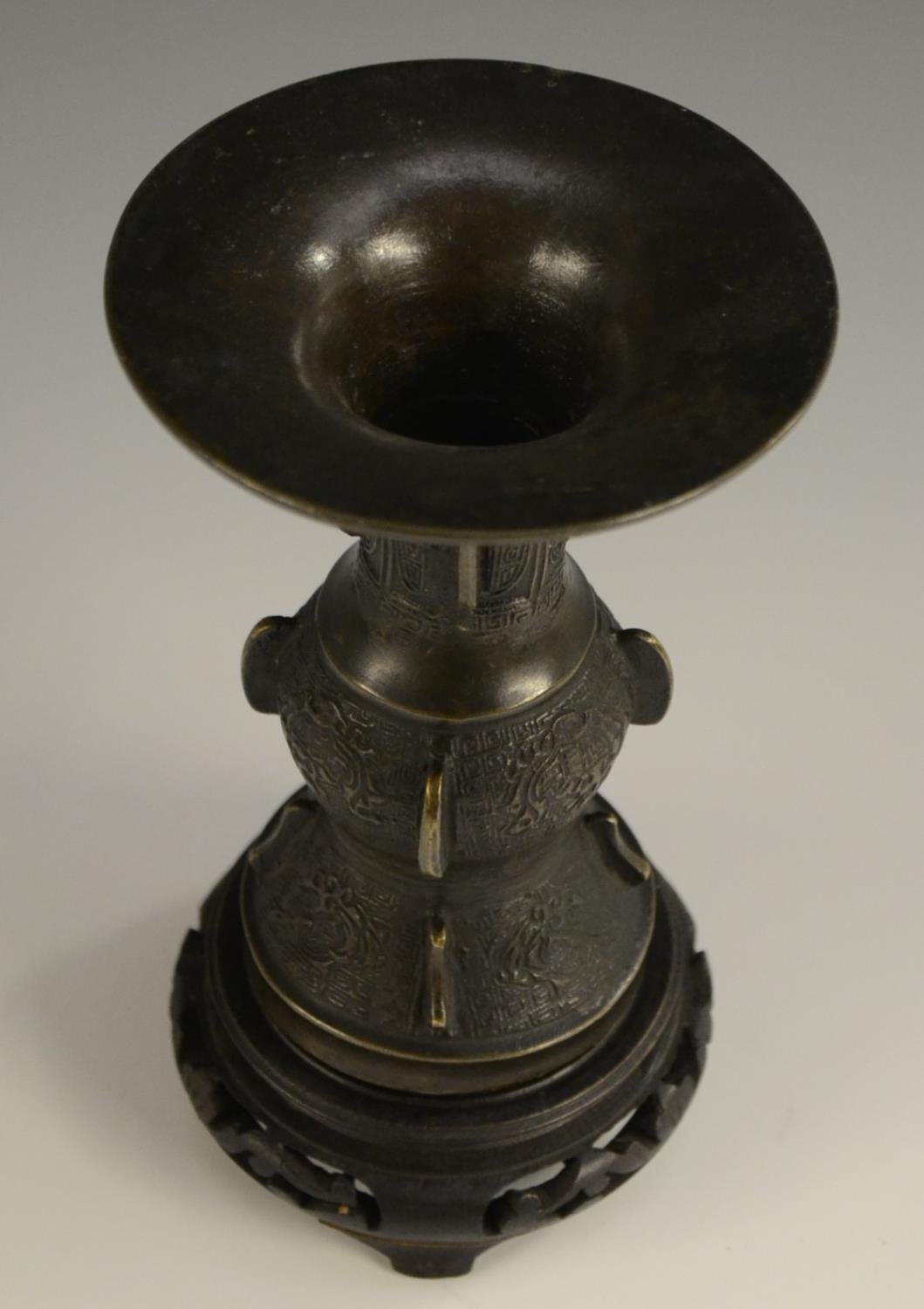 A 19th century Chinese bronze gu beaker vase, cast in the Archaic manner, 14cm high, - Image 4 of 5