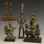 Tribal Art - a Yoruba bronze figure group, of a man and woman playing Ayoayo, 9cm wide,