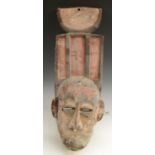 Tribal Art - an Bobo mask, geometric plank cresting, picked out in earth tones, 56cm long,