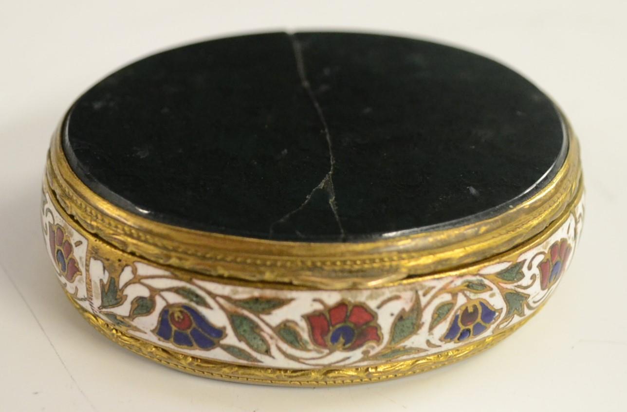 A 19th century agate mounted gilt metal and enamel oval snuff box, hinged cover,