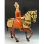 A substantial Indian polychrome figure, of a noble on horseback,