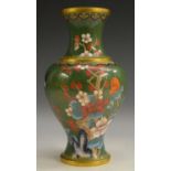 A Japanese cloisonné vase, enamelled with peonies and other foliage on a green ground, 23.