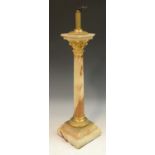 An early 20th century gilt-metal mounted onyx Corinthian column table lamp,