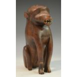 Tribal Art - an African carving, of a baboon, the eyes picked out with white pigment,