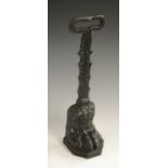A 19th century cast iron door porter, as a lion paw, posted acanthus loop handle,