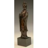 Chinese School, a brown patinated bronze, of Guanyin, 15cm high,