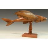 Travel and the South Seas - a Pitcairn Island carving, of a flying fish.