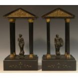 A pair of 19th century gilt metal mounted belge noir library porticos,