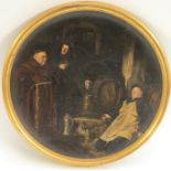 A late 19th century terracotta circular charger, painted with a drunken monk,