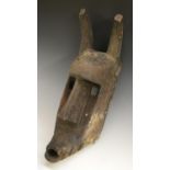 Tribal Art - a Bamana N'tomo mask, carved as a stylised hyena, 48cm long,