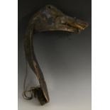 Tribal Art - a Hausa hunter's bird decoy headress, as a hornbill, leather clad, 39cm long,