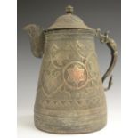 A Kashmiri copper flagon, profusely chased in the Persian taste with stylised lotus,